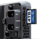 Close-up of Atomos Ninja TX monitor-recorder with HDMI inputs and CFexpress 4TB card inserted by USB port