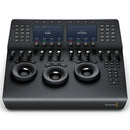 Blackmagic DaVinci Resolve Mini Panel with trackballs, dual LCD screens, and multiple control buttons for professional color grading and video editing.