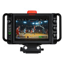 Blackmagic Studio Camera 6K Pro with large touchscreen viewfinder and ergonomic controls capturing live basketball game