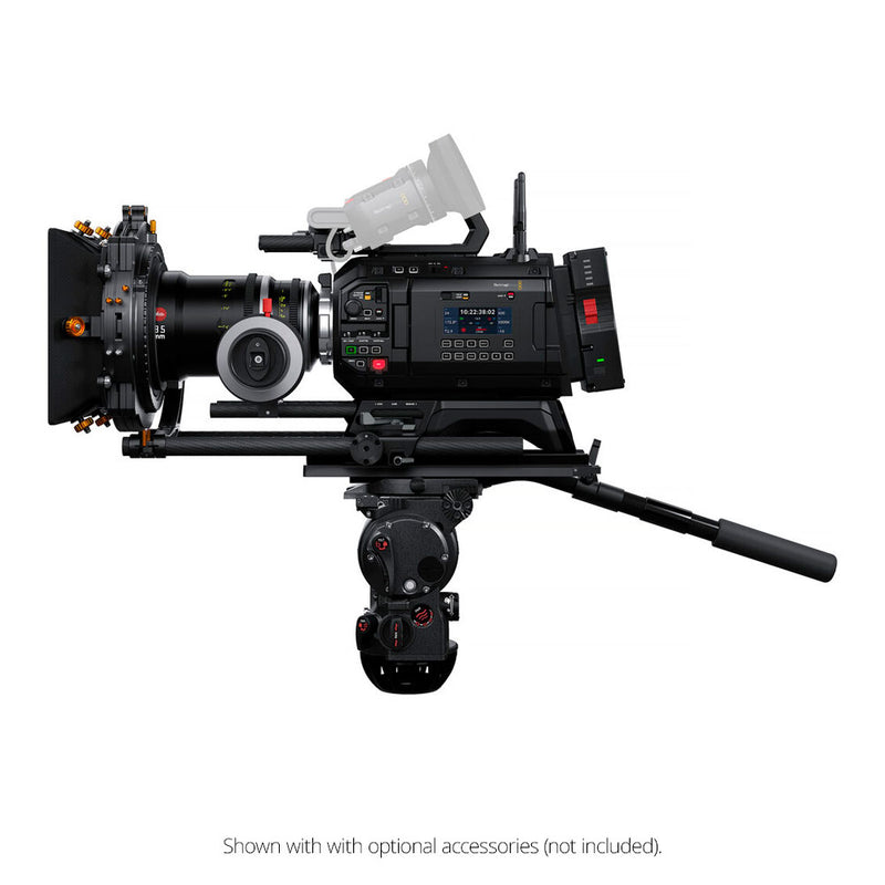 Professional video camera with various accessories on a white background.