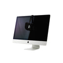 ColorChecker Studio device calibrating an iMac monitor for accurate color management and profiling