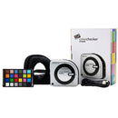 Calibrite ColorChecker Studio color management device with software, color calibration target, USB cable, and carrying case for photographers and filmmakers.