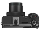 Canon Powershot V1 camera top view with extended lens and control buttons for video shooting and zoom.