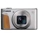 Canon powershot SX740 HS in silver with a tan grip on a white background