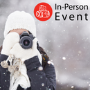 Person in winter clothing holding camera outdoors with snow, promoting Intro to Photography Seminar in-person event