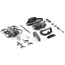 DJI Avata 2 Drone Fly More Combo with FPV goggles, controller, extra propellers, and accessories laid out on white background