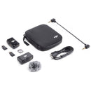DJI Mic 2 wireless microphone system with transmitters, receiver, carrying case, cables, and windscreen accessory.