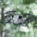 DJI Mini 4 Pro drone with 360° propeller guard flying outdoors for improved safety