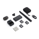 DJI Osmo 360 camera adventure combo with accessories including batteries, selfie stick, charger, and carrying case on white background