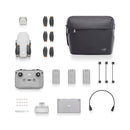 DJI Mini 4K Drone Fly More Combo with drone, remote controller, batteries, propellers, charging hub, and carrying bag