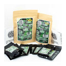 Flic Film C-41 Eco home developing kits (both 8-roll and 16-roll) contents on a white background