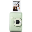 FUJIFILM Instax Mini LIPLAY instant camera and smartphone printer in mint green with printed photo of two smiling women