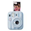 Blue Fujifilm instant camera with a photo of two people on a white background