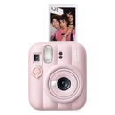 Pink instant camera with a photo of two people on a white background