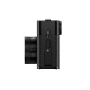 Side view of the compact black FUJIFILM X Half camera with textured grip and lens on the left side