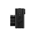 Side view of compact black FUJIFILM X Half camera with textured grip and lens