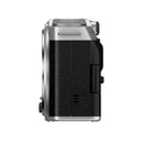 FUJIFILM X-M5 digital camera side view with textured grip and silver body