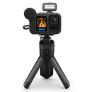 GoPro HERO13 Black camera with tripod, external microphone, and LED light for professional video recording