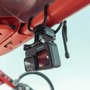 GoPro GUMBY Flexible Mount securing GoPro camera to red metal bar with flexible twist ties