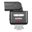 Godox iT32 Mini Flash with X5 TTL Wireless Flash Trigger showing modular design and magnetic mount