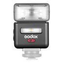 Godox iT32 Mini Flash with X5 TTL wireless flash trigger and magnetic modular system on camera