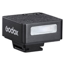 Compact Godox iM20 camera flash with lithium battery and Type-C charging for portable, adjustable lighting.