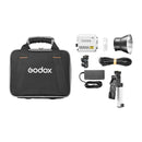 Godox ML60II Bi-Colour LED Monolight Kit with carrying case, light, power adapter, mount, reflector, and cables for portable studio lighting