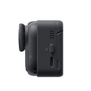 Compact black Insta360 Go Ultra action camera showcasing side ports and buttons in a portable design