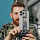 Kondor Blue Stalman Clamp mounted on iPhone for vertical video shooting by content creator