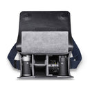 Leica M-System Leather Bag open showing camera compartments and lenses inside compact black leather case