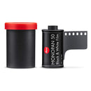 Leica MONOPAN 50 black and white 35mm film roll with red capped container and partially unspooled film strip