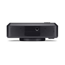 Bottom view of black Leica Sofort 2 instant hybrid camera showing tripod mount and battery compartment.