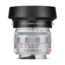 Leica Summilux-M 50mm f1.4 silver camera lens with vintage design and modern precision