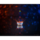 Creative water droplet photography with Lensbaby Composer Pro II and Twist 60 optic, featuring swirly background blur and vibrant bokeh effects.