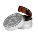 Lomography tin can with open lid storing 110 film negatives in silver metal container