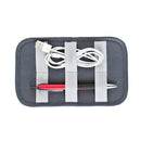 LowePro GearUp Pouch Mini grey organizer with elastic straps holding cable and pen, compact sustainable accessory pouch