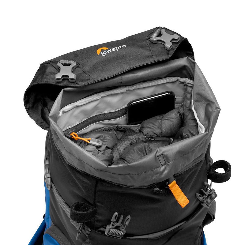 LowePro PhotoSport Outdoor Backpack 15L AW III open showing organized interior compartments and padded camera gear protection.