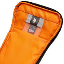 Inside view of Lowepro GearUp Creator Box M II Green Line camera bag organizer with orange padded interior and memory card pocket