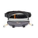 LowePro Trekker Lite HP 100 compact camera bag in grey with adjustable strap and organized compartments for travel photography