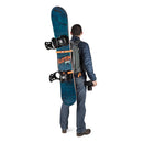 Lowepro Whistler 350 AW II backpack carrying snowboard and camera, designed for outdoor and alpine gear protection