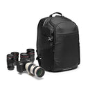 Black camera backpack with a camera and lenses on a white background
