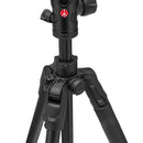 Close-up of Manfrotto BeFree AS aluminum tripod kit showing the top spider and ergonomic leg-angle selector with black and red design accents