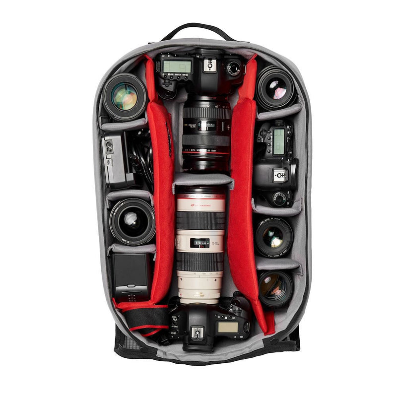 Camera case with camera equipment including lenses and a camera body on a white background