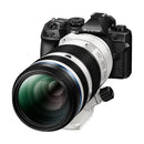 OM System M.Zuiko 50-200mm f2.8 IS PRO super-telephoto zoom lens mounted on OM-1 camera with weather-sealed design and large front element.