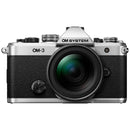 OM System OM-3 mirrorless camera with 12-45mm f4 PRO lens in silver and black, featuring 20MP sensor and advanced autofocus.