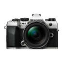 OM System OM-5 Mark II mirrorless camera with 12-45mm f4 PRO lens front view, compact and lightweight design