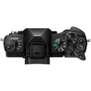 Top view of OM System OM-D E-M10 Mark IV mirrorless camera with control dials and buttons visible