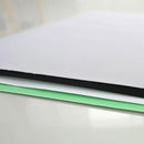 OrangeMonkie Foldio2 Plus backdrop set with white, black, gray, and green paper backgrounds