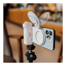 A phone with the PGYTECH MagCamphone grip and MagGlow fill light mounted to a tripod, illustrating the light's rotation capability