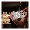 A person takes a product shot using their phone with the PGYTECH MagGlow Fill Light